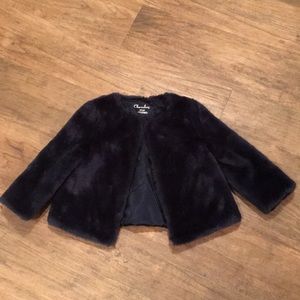 Navy blue faux fur with clasp around neck